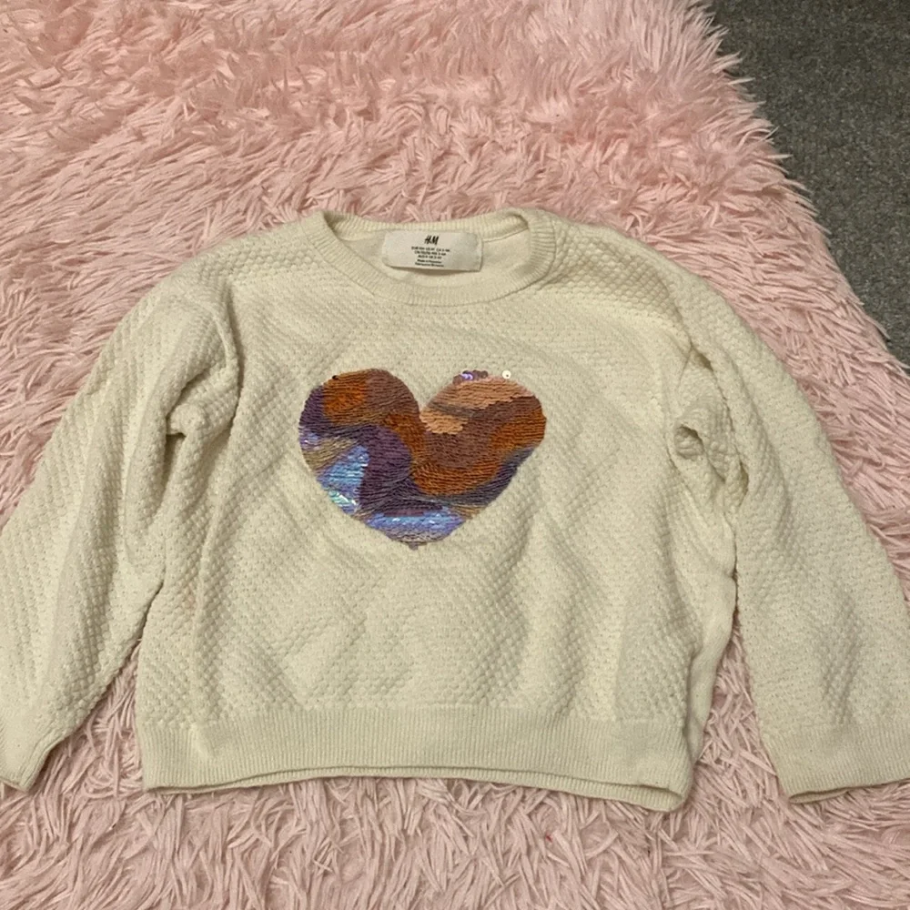 Pair of girls sweaters